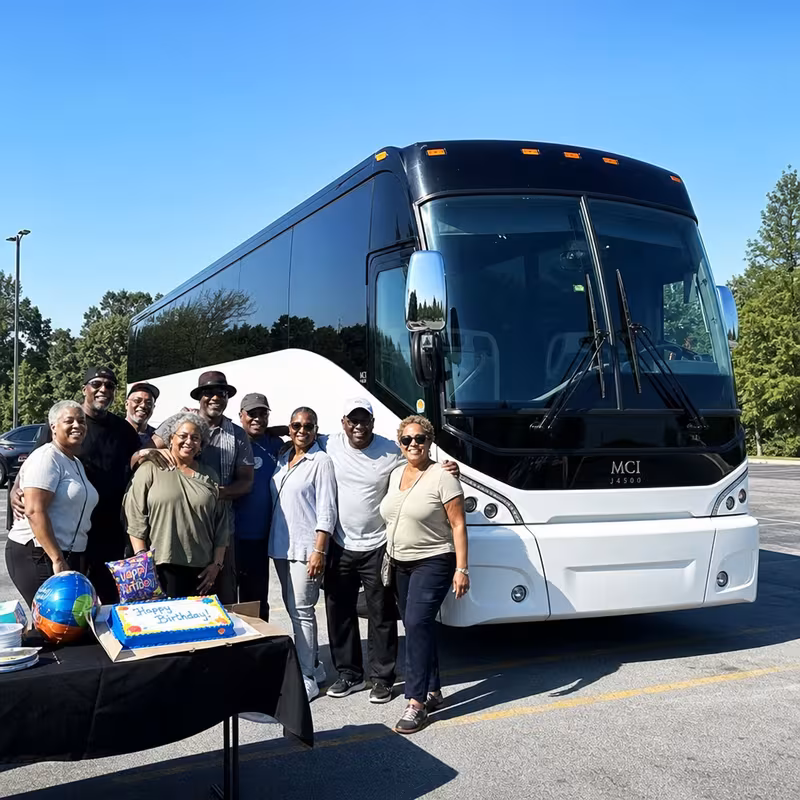 Passengers loading luggage while boarding an Fremont group shuttle