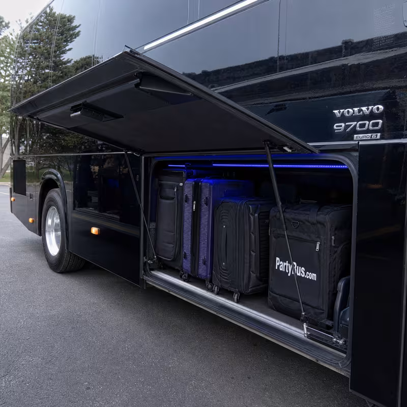 Party bus interior with wraparound leather seating and LED lighting in Fremont
